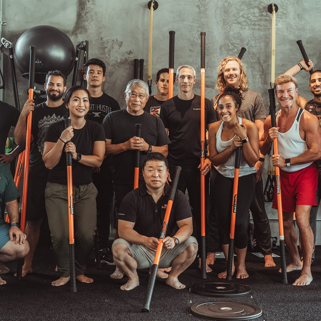 Group of people posing for a photo after completing the Stick Mobility Level 1 Certification