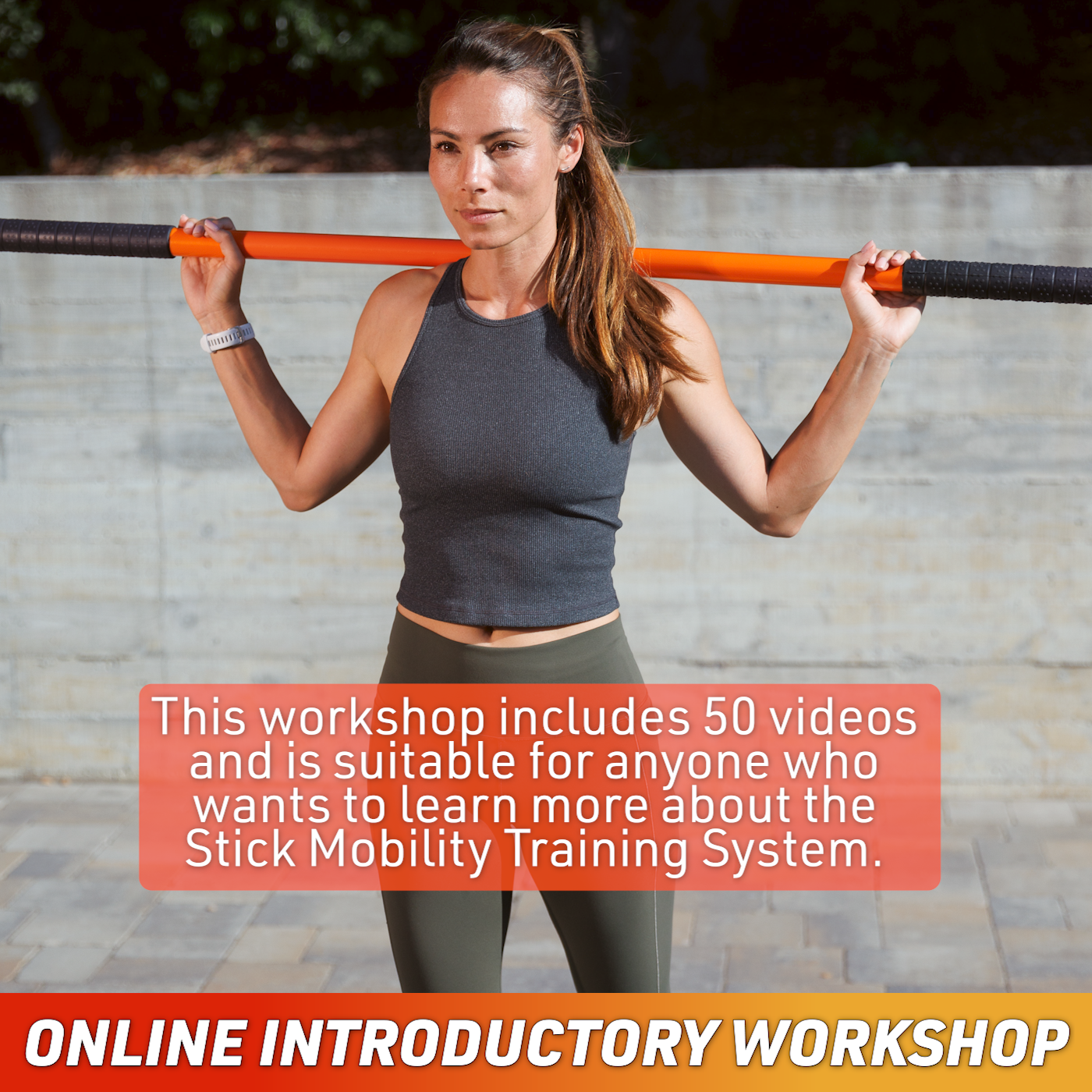 Woman holding a training stick behind her back with text saying, "This workshop includes 50 videos and is suitable for anyone who wants to learn more about the Stick Mobility Training system."