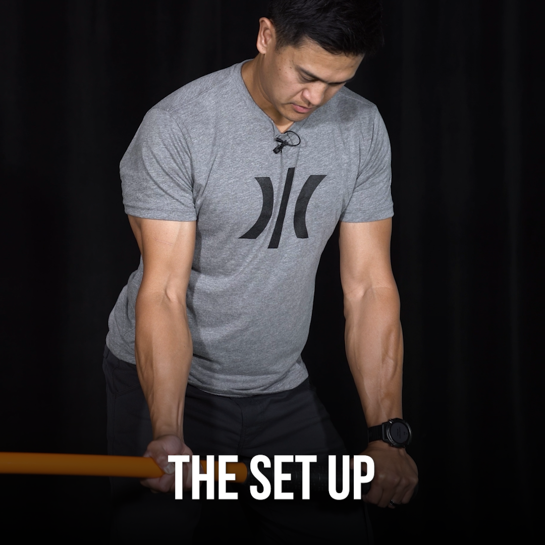 Man performing an exercise from the golf set up