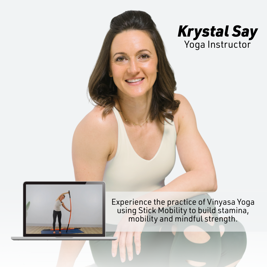 Woman in a yoga pose with a laptop showing a yoga video, branded as Krystal Say Yoga Instructor.
