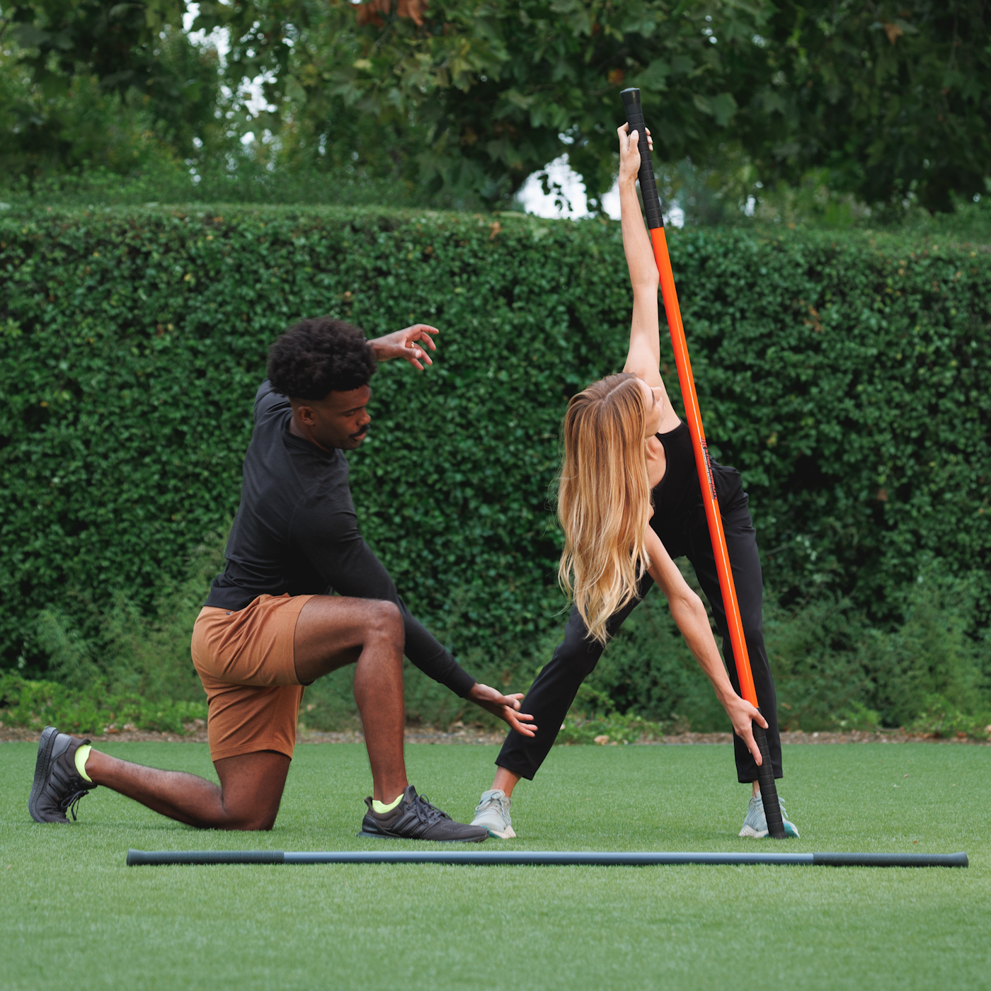 Man Training Woman with Stick Mobilty 