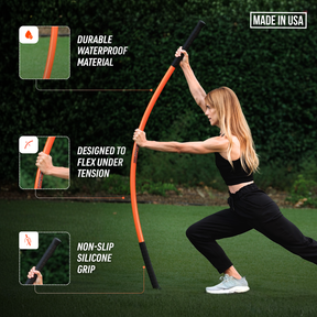 A woman outdoors on grass performs a movement using Stick Mobility Training Sticks. Three inset callouts highlighting waterproof material, flexibility under tension, and a non-slip silicone grip. A 'MADE IN USA' badge appears in the top right.